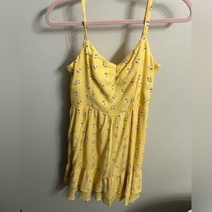 Hollister Mid-Thigh length dress with adjustable straps and ties in the back